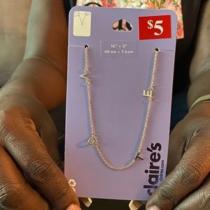 Claire’s “VOTE” necklace